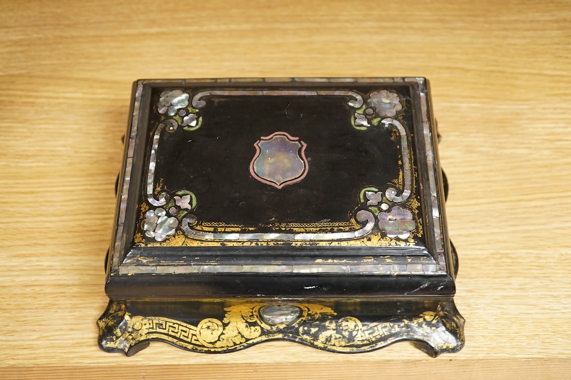 A Victorian papier maché jewellery box, abalone inlaid, 25cm wide